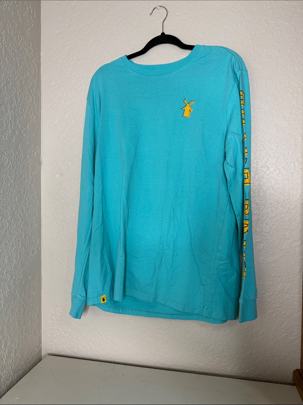 Dutch Bros Turquoise Crewneck Tee with Black Logo never worn